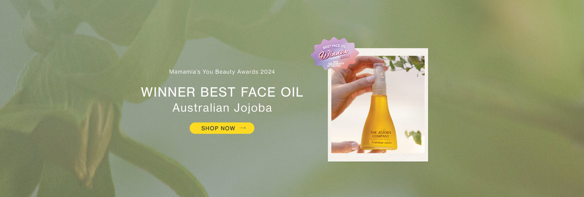 Ad for Best Face Oil winner, Australian Jojoba, with a shop now button and a hand holding the product.