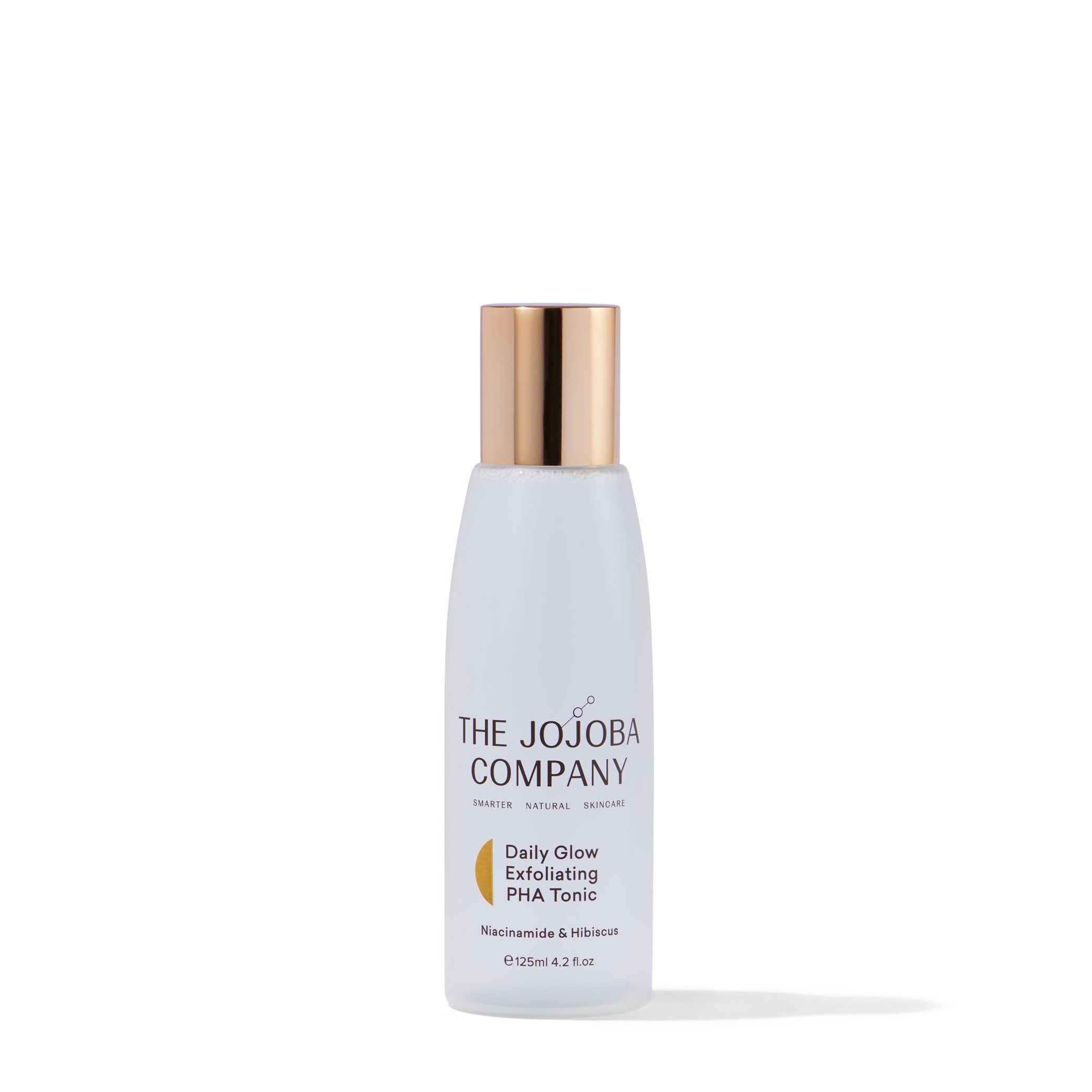 Bottle of The Jojoba Company Daily Glow Exfoliating PHA Tonic skincare product.