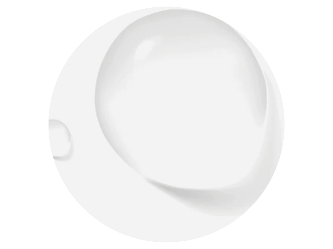 A white porcelain soup bowl on a black background with shadows on the right side.