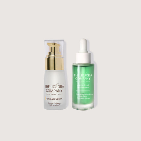 Two skincare products from The Jojoba Company on a light gray background