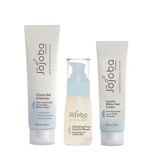 Three Jojoba skincare products: cleanser, serum, and water gel cream on a white background.